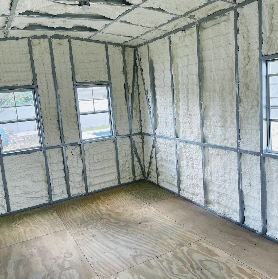 Closed-cell spray foam insulation applied to wall cavities in a residential project in South Miami